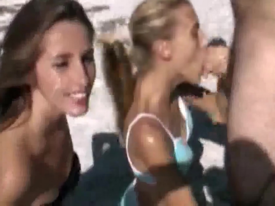 Double blowjob and facial on the beach